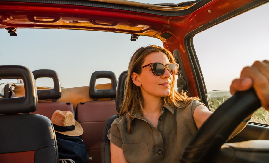 a woman driving a car