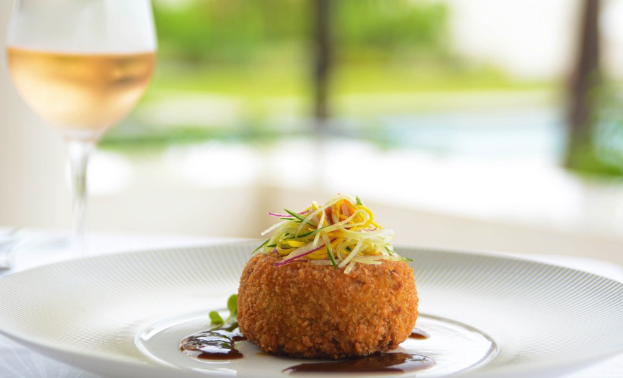 a piece of cake with a side of wine