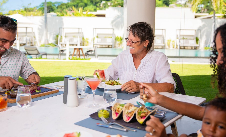 a group of people eating at a table