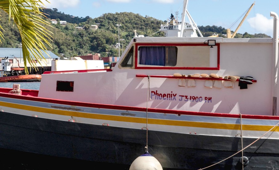 a boat docked on a dock