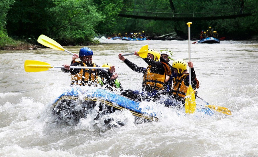 a group of people in a raft