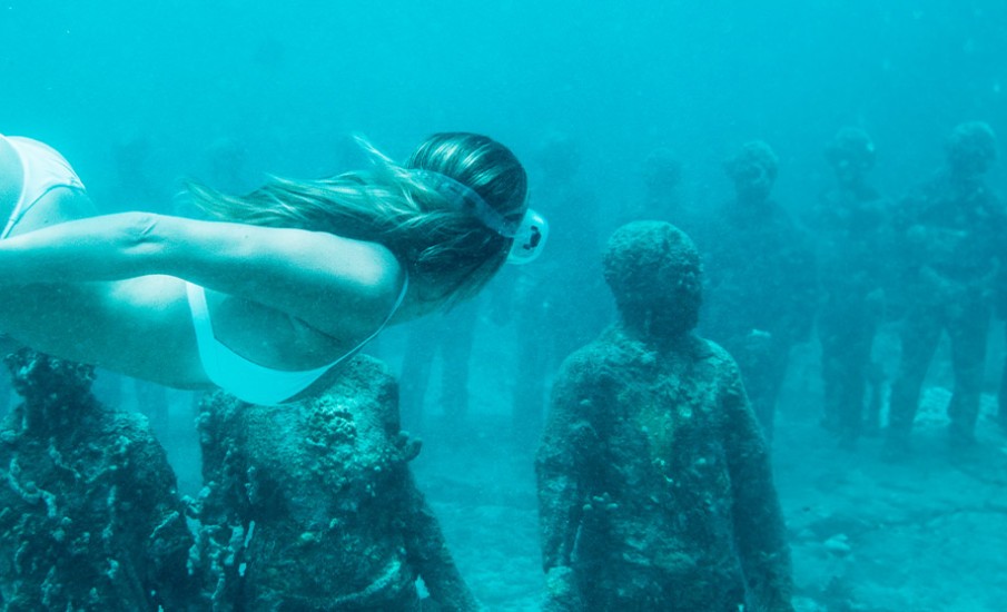 a group of people in a tank