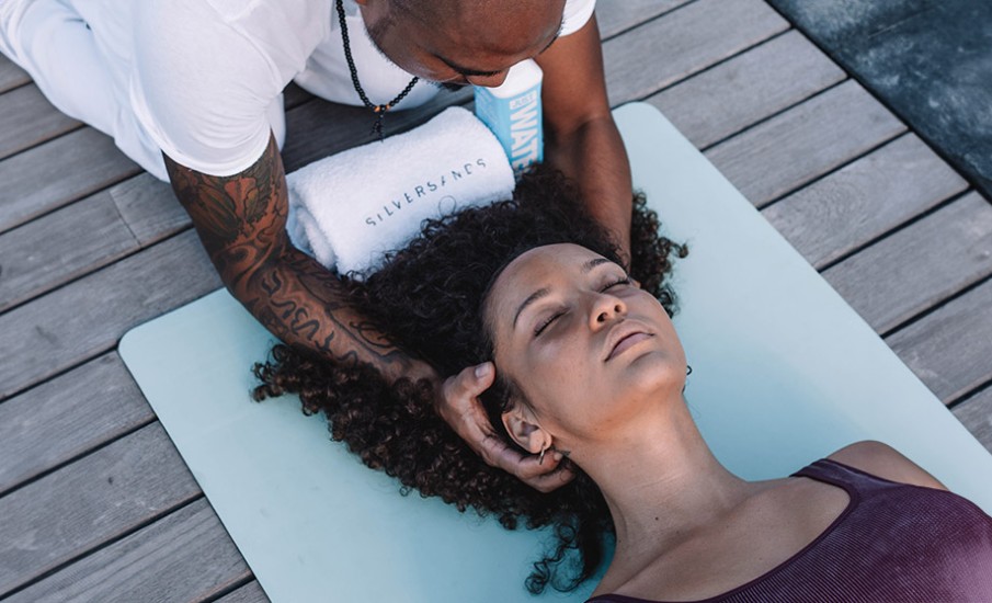 a person lying in a pool