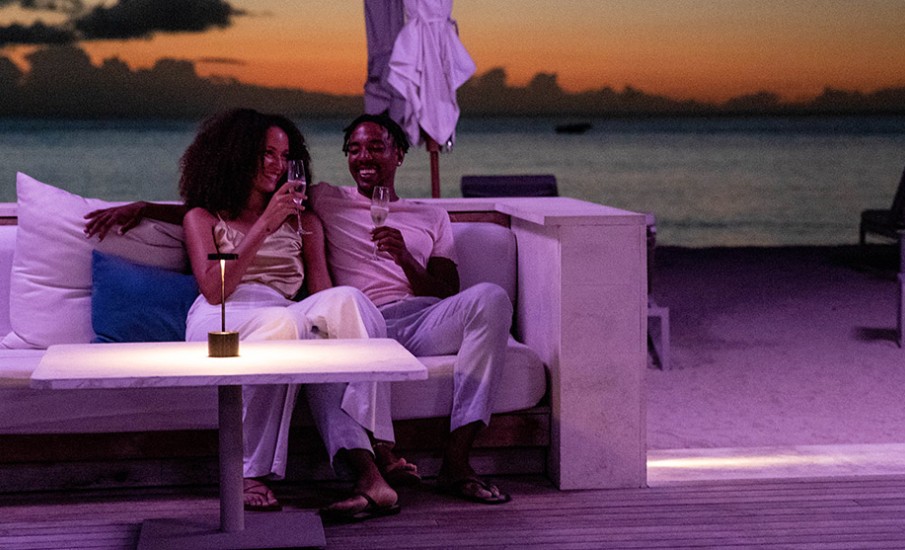 a man and woman sitting on a couch