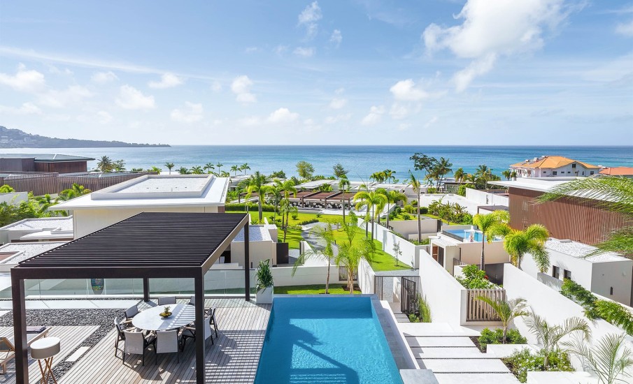 Overhead view of a rooftop pool of a private hotel suite in Grenada at Silversands Grand Anse.