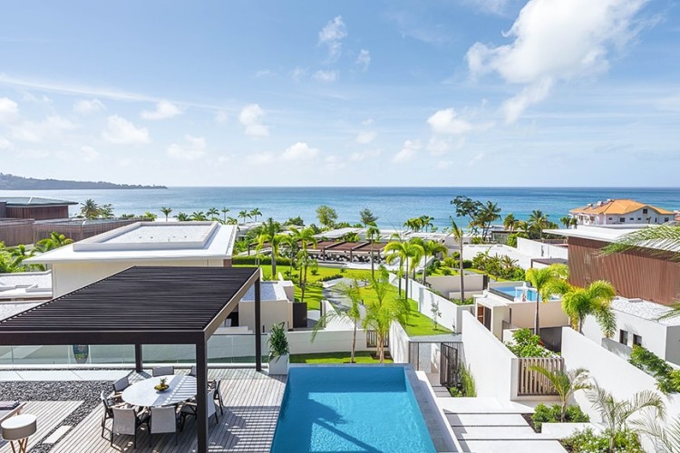 Bird-eye view of a private rooftop pool at Silversands Grand Anse resort.