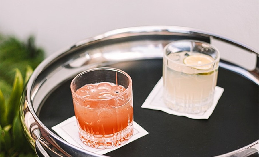 Two cocktails on a tray a bar in Grenada at Silversands Resort Grand Anse.