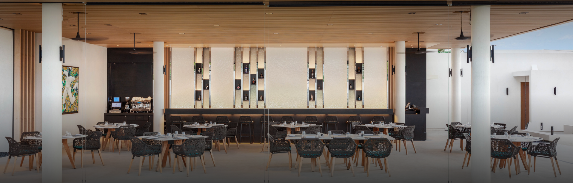 a room with tables and chairs