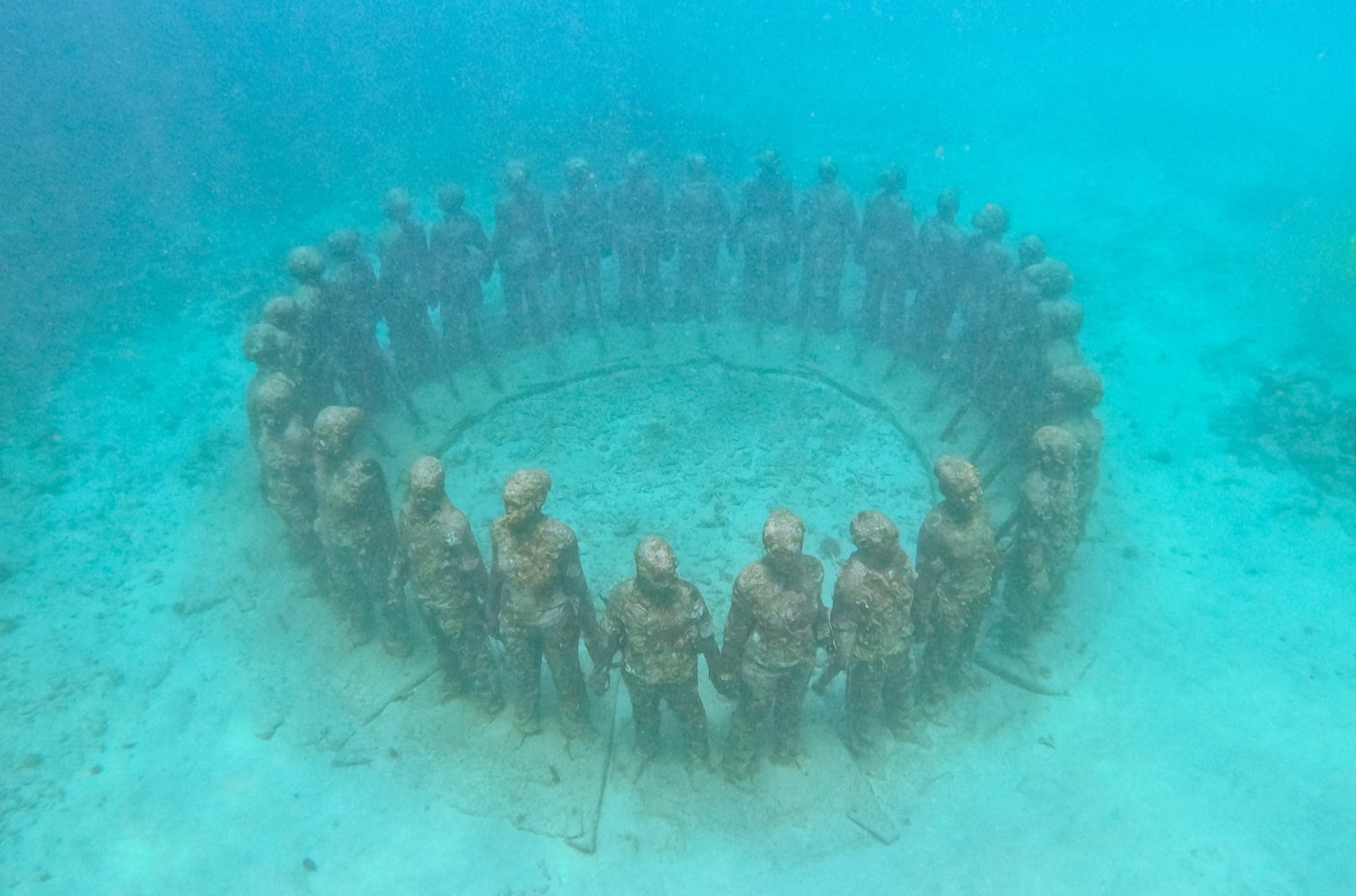 a group of statues in a circle