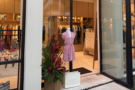 a mannequin in a dress on a mannequin in a store