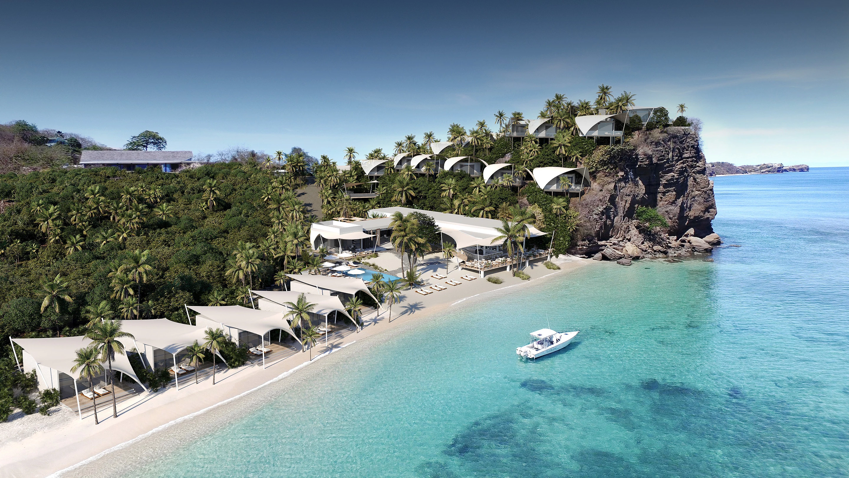 a beach with houses and trees 