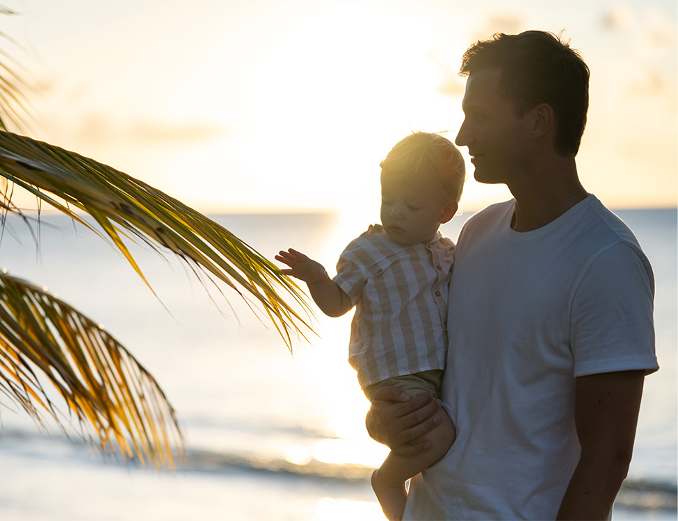 a man holding a baby