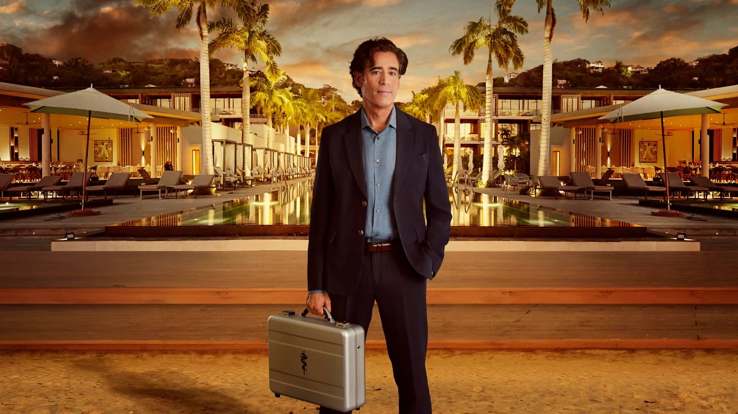 a man holding a briefcase in front of a pool