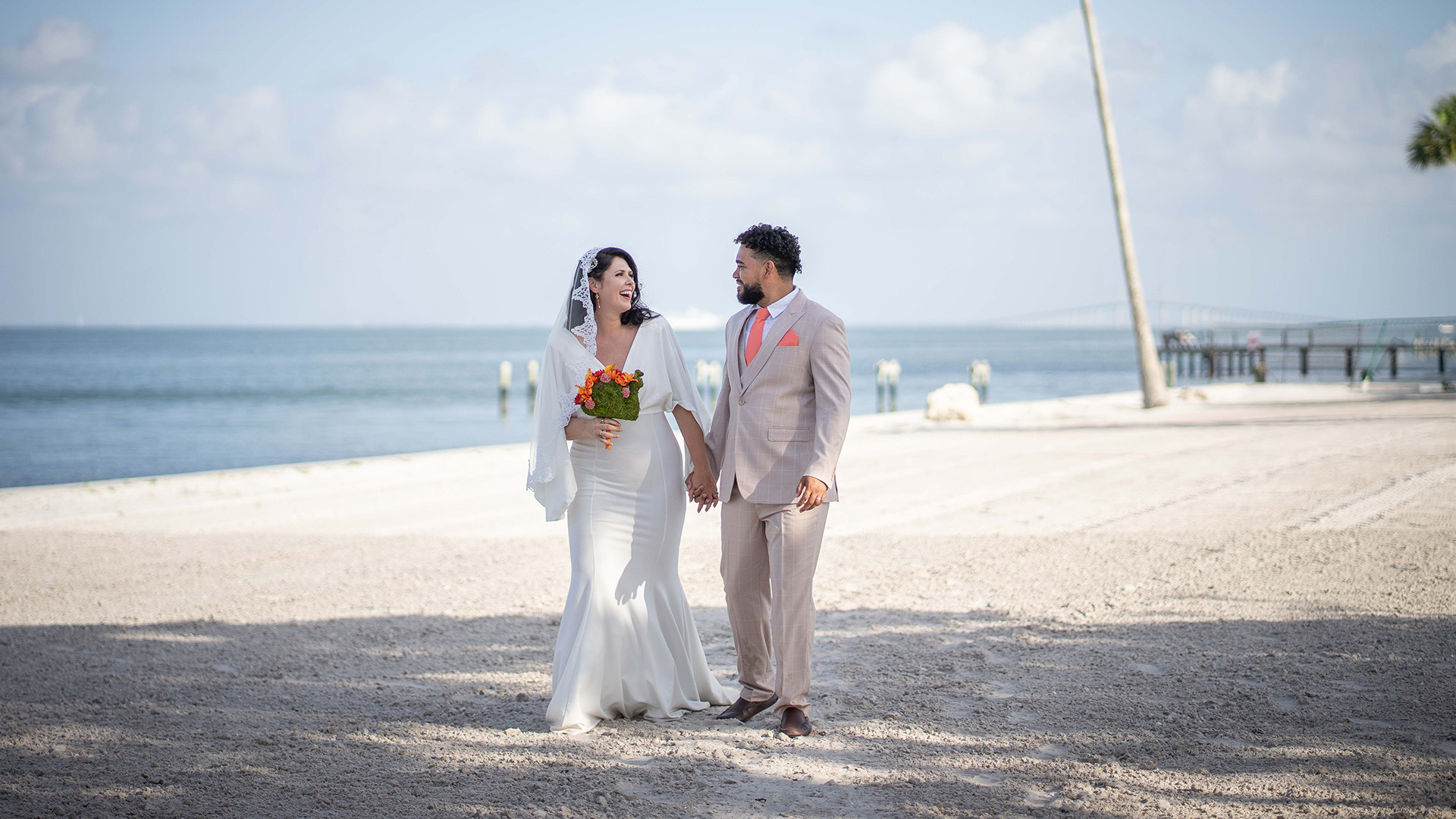 a man and woman in wedding attire
