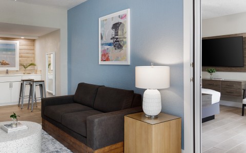 a couch and lamp in a room