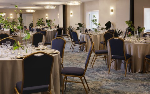 a room with tables and chairs