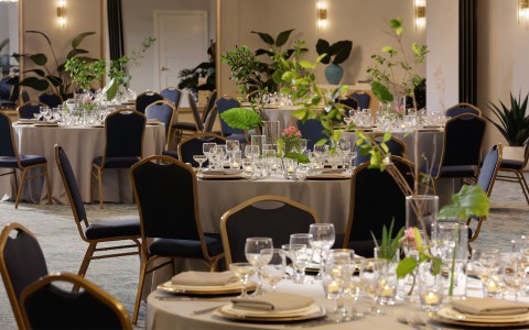 a room with tables and chairs