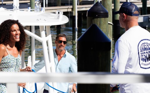 a man in sunglasses on a boat