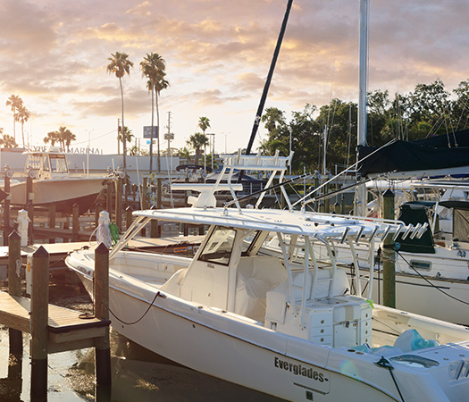 a group of boats docked at a dock