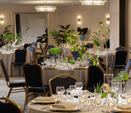 a room with tables and chairs