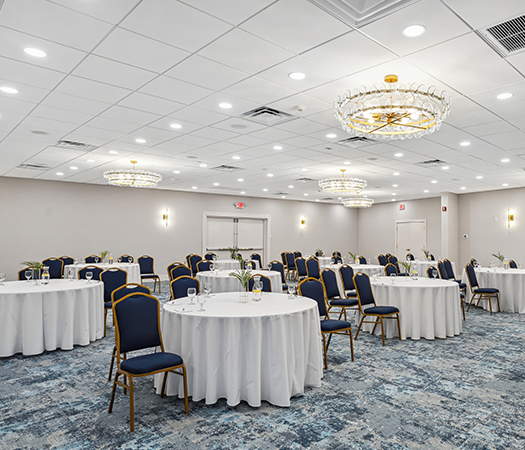 a room with tables and chairs