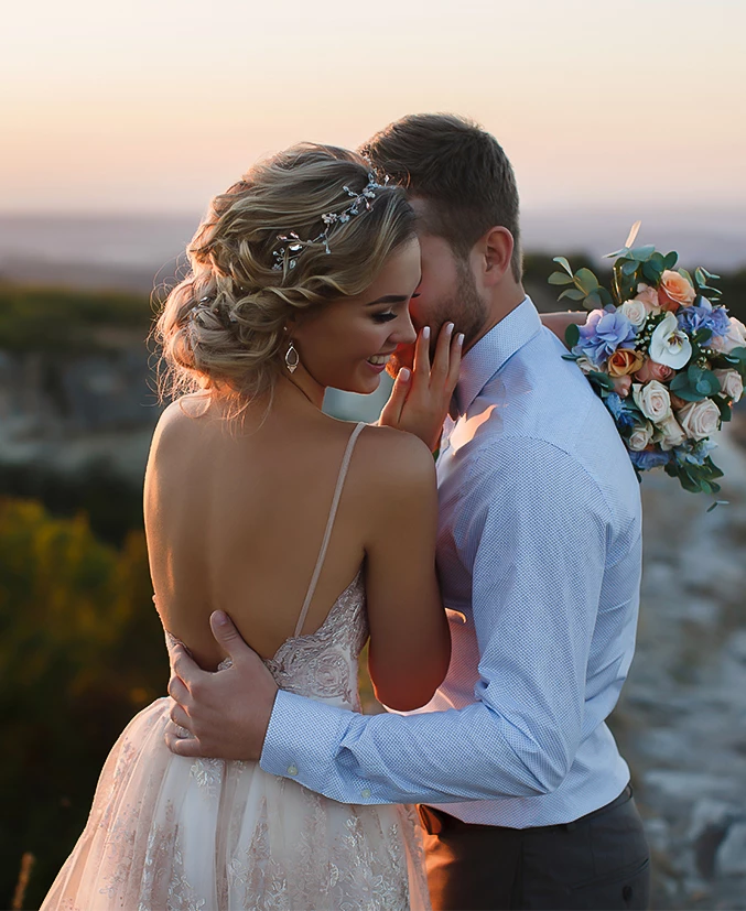 a man and woman hugging each other