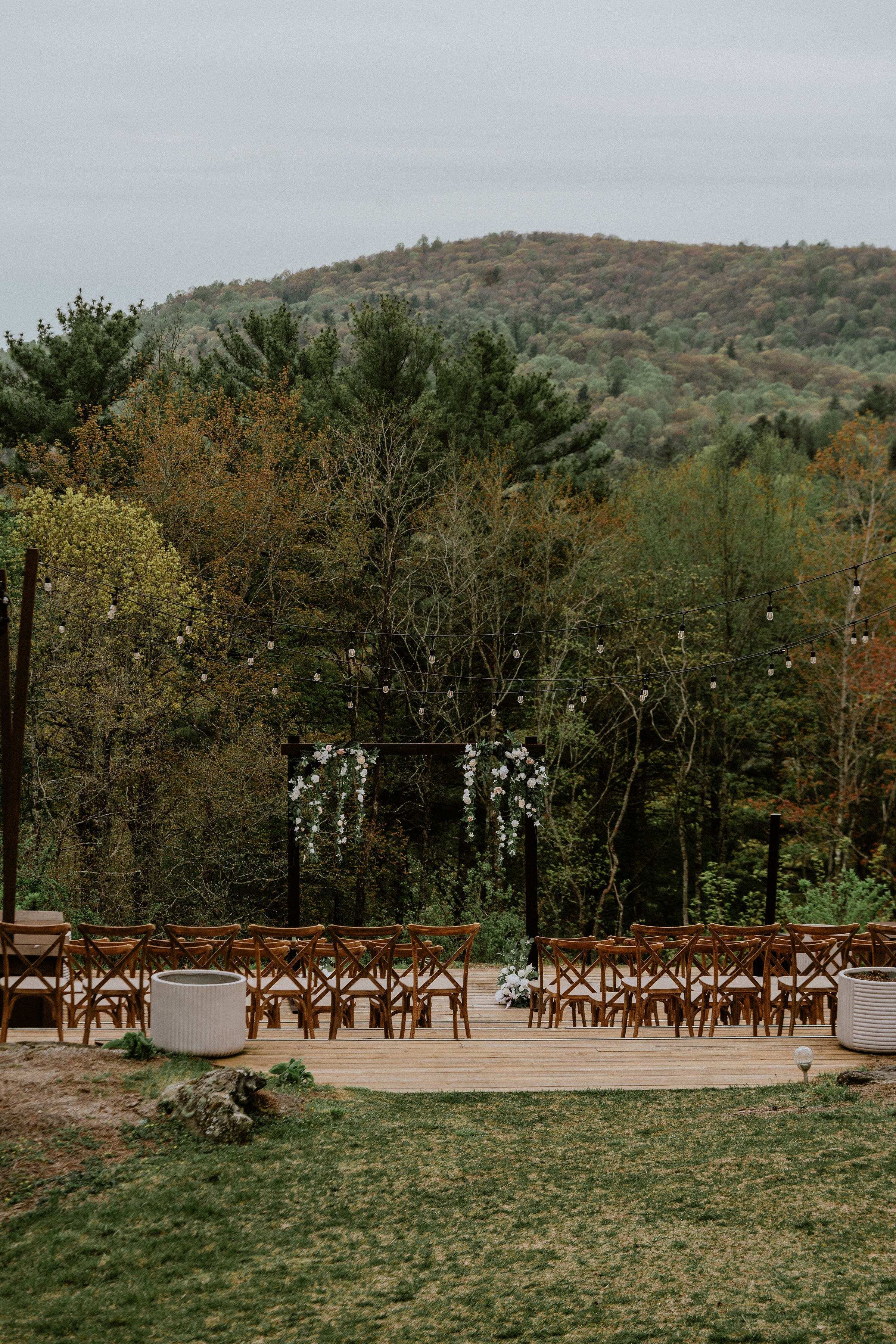 a group of tables and chairs in a park