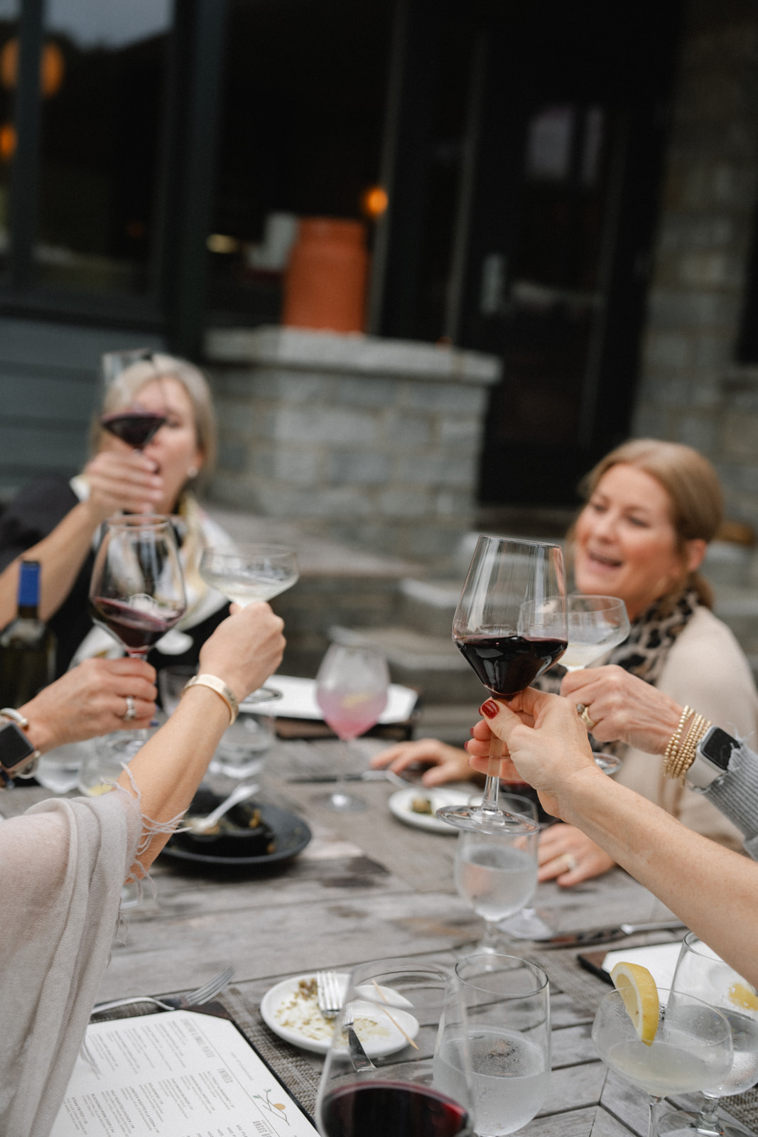 women are drinking wine