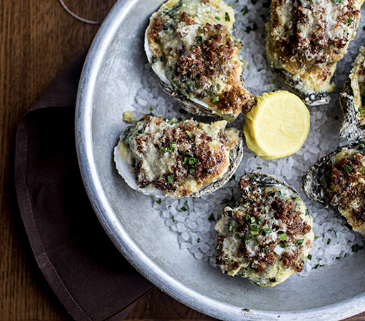 a plate baked oysters