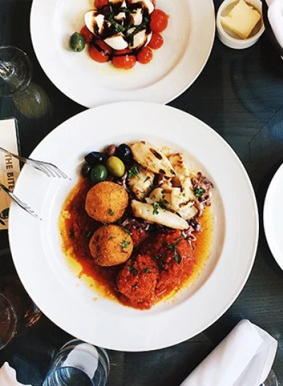 a table with two plates of food on it
