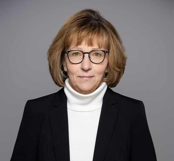 a woman in a black suit