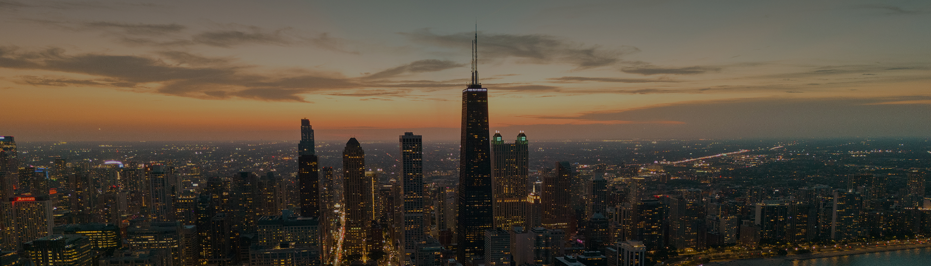 a city skyline with tall buildings