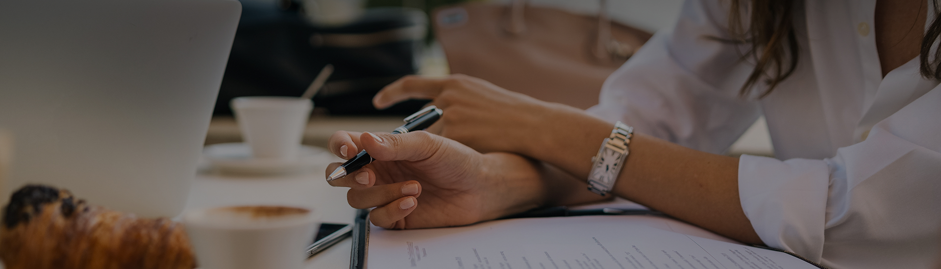 a person holding a pen
