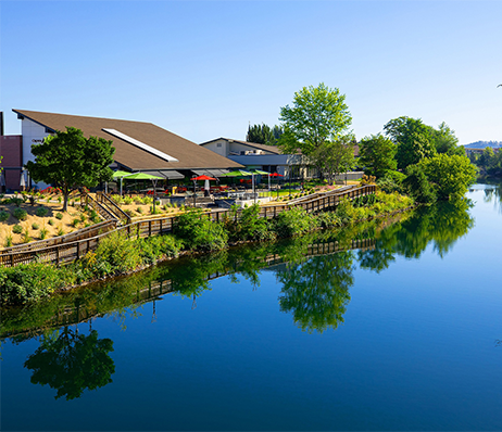 a building next to a body of water