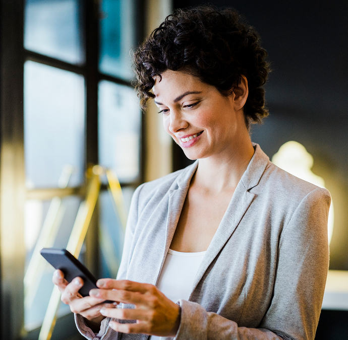 a woman looking at a phone