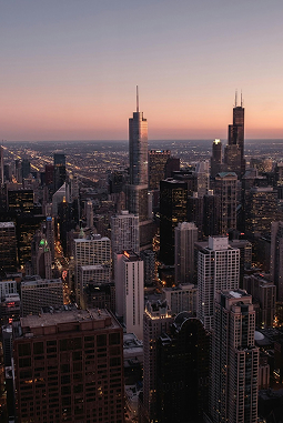 a city skyline with tall buildings