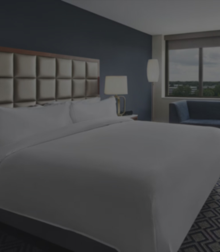 a bed in a hotel room