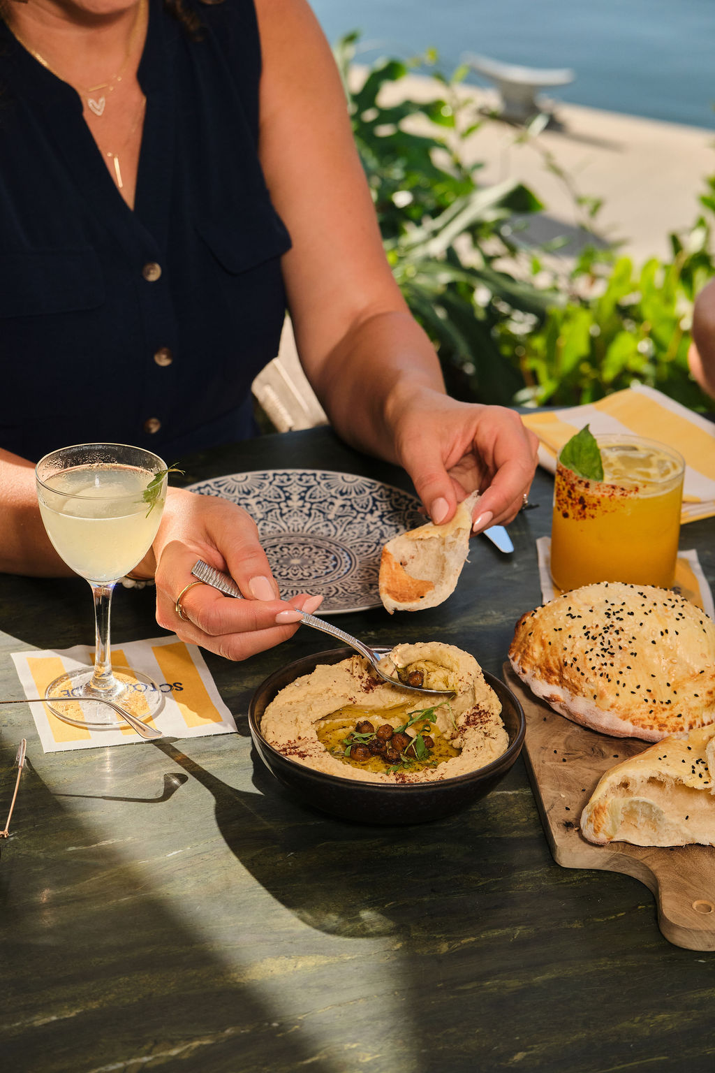 a person eating food at a table