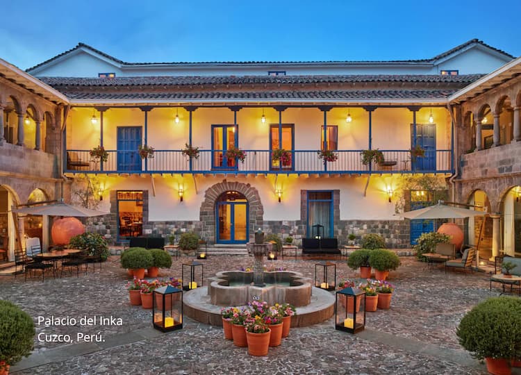 hero image for a building with a fountain and flowers