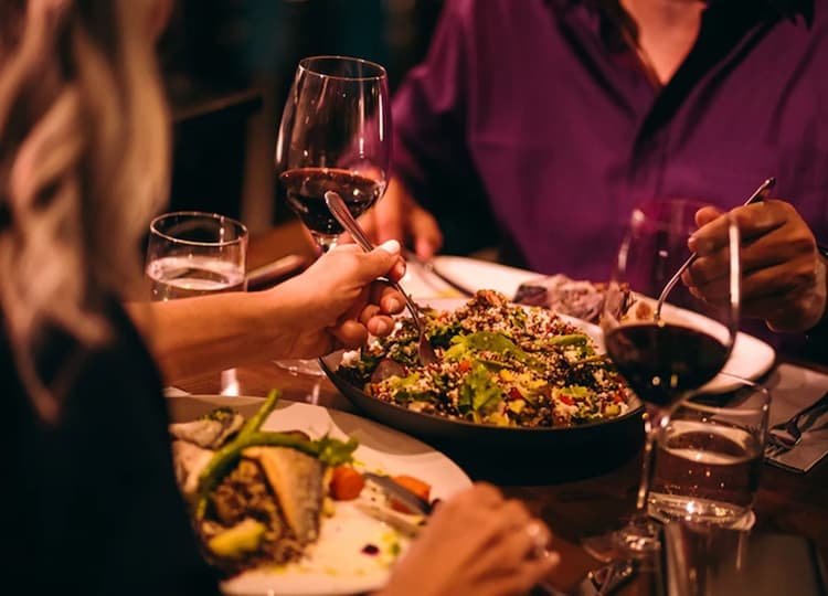 hero image for a group of people eating at a table
