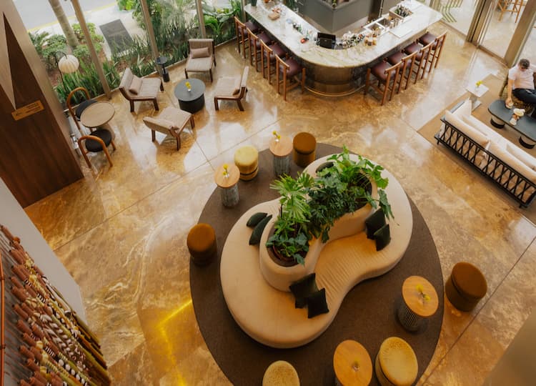 a room with a large table and chairs