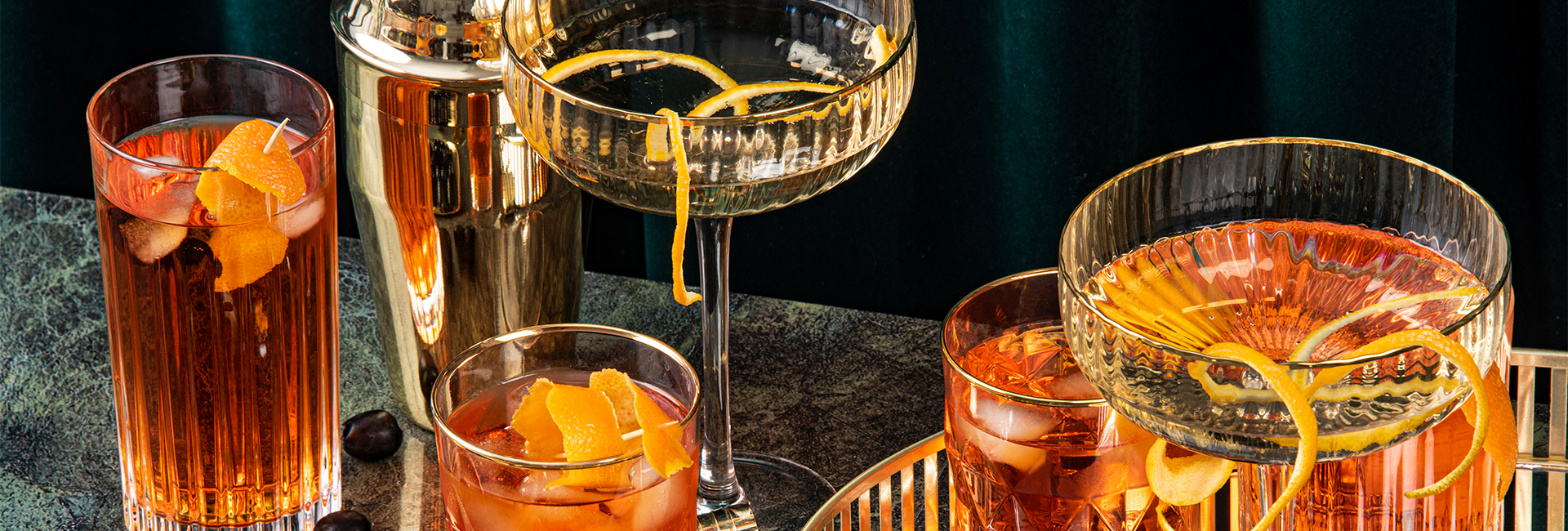 a group of glasses with oranges