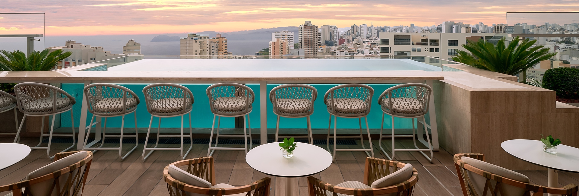 a table and chairs on a rooftop