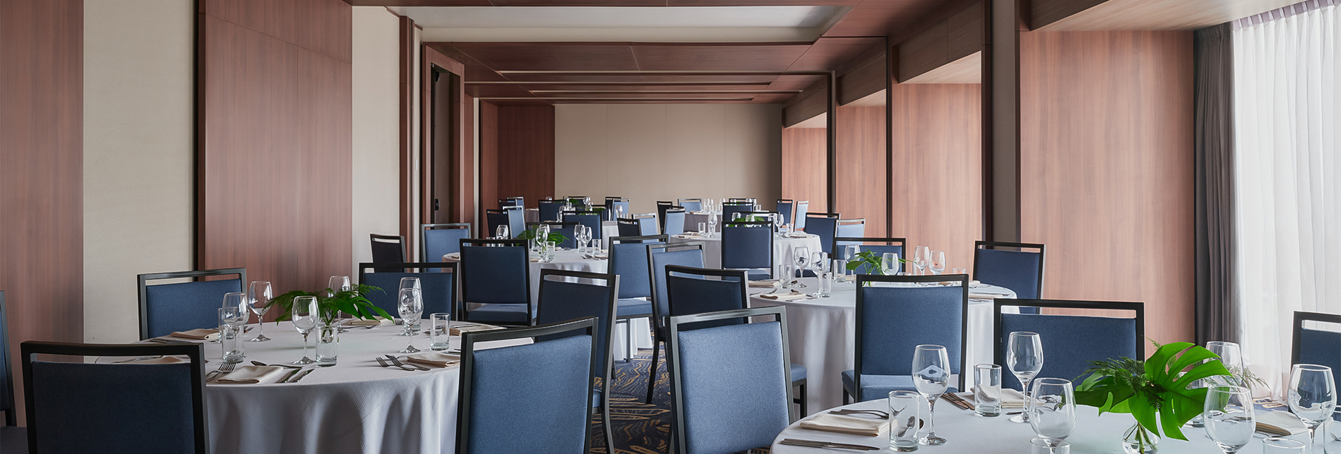 a room with tables and chairs