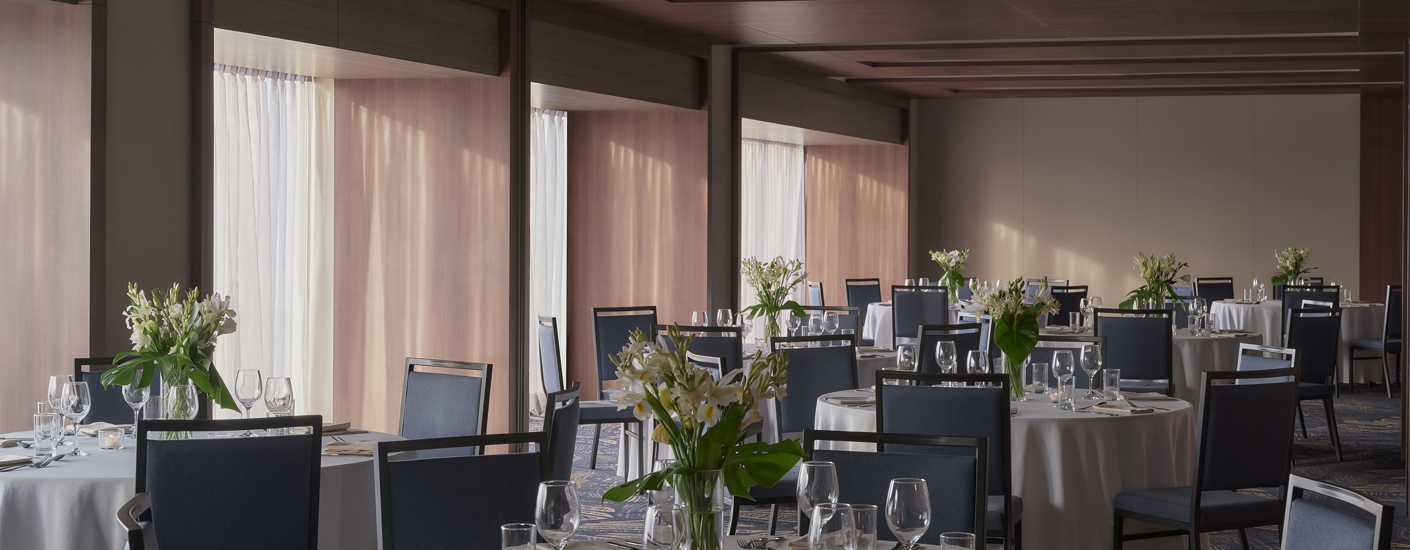 a room with tables and chairs