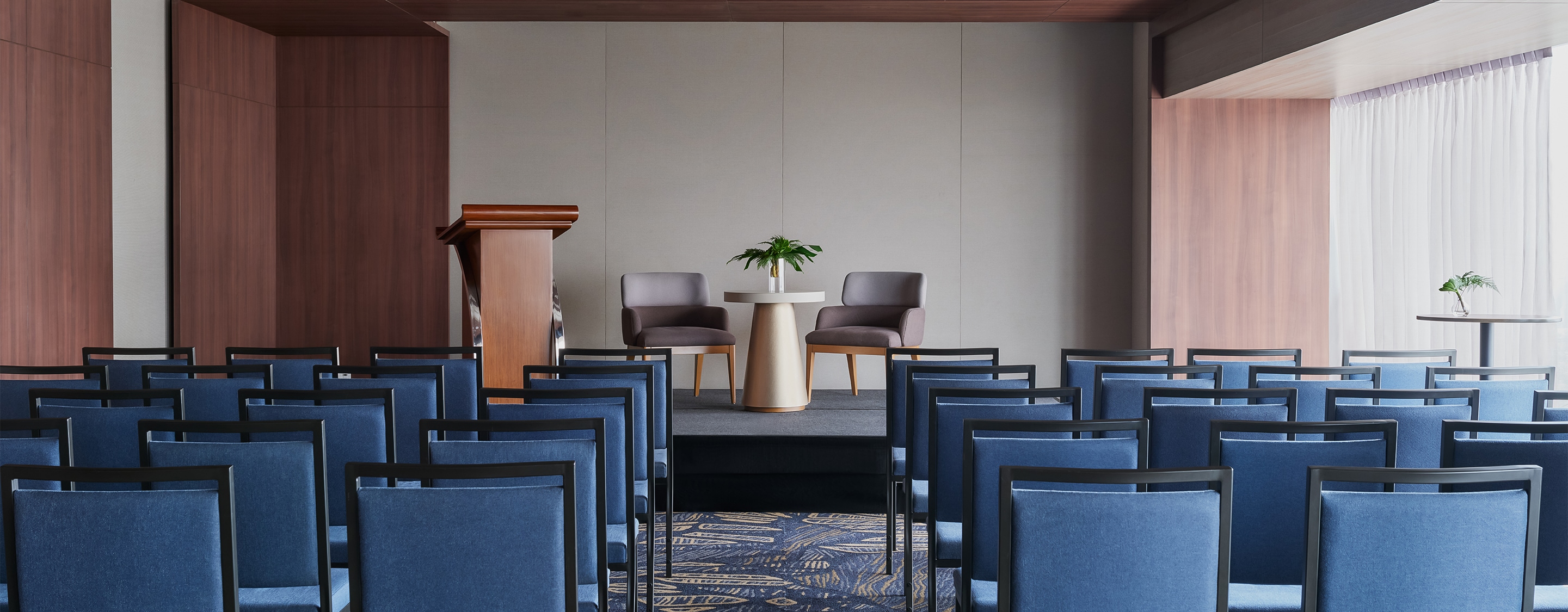 a room with chairs and a table