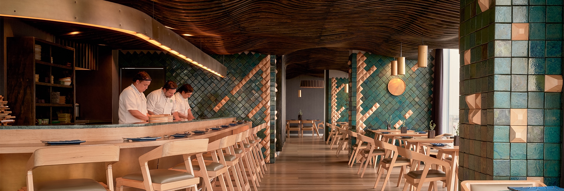 a woman standing at a bar