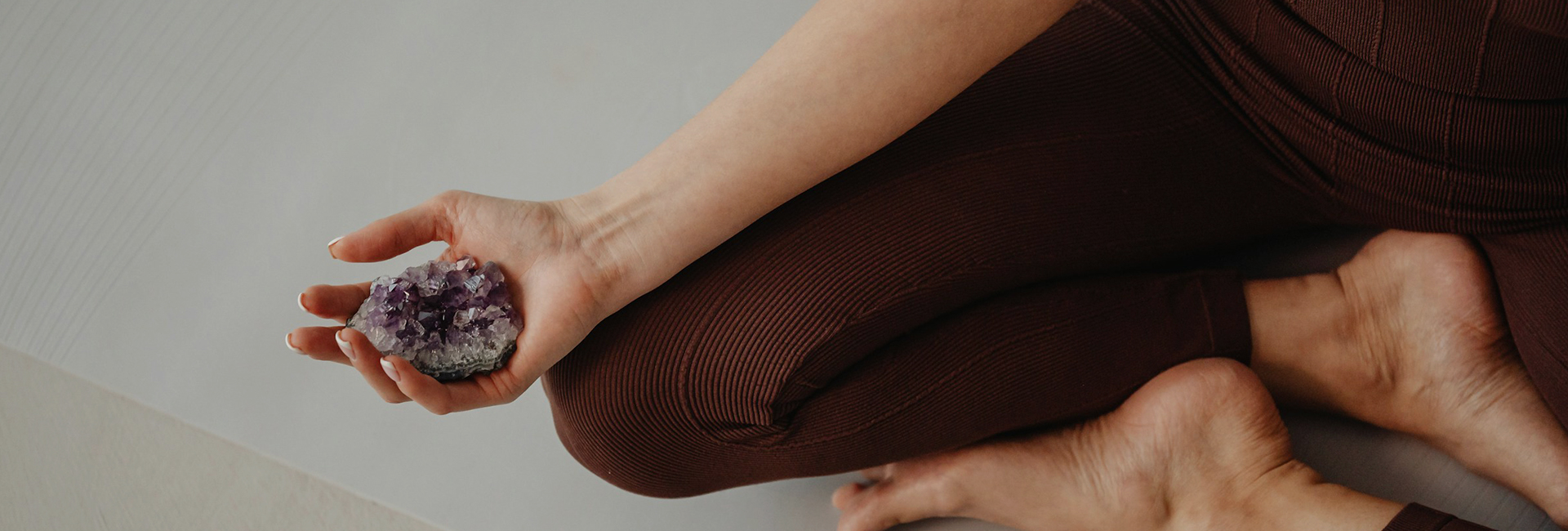 a person's hand in a yoga pose