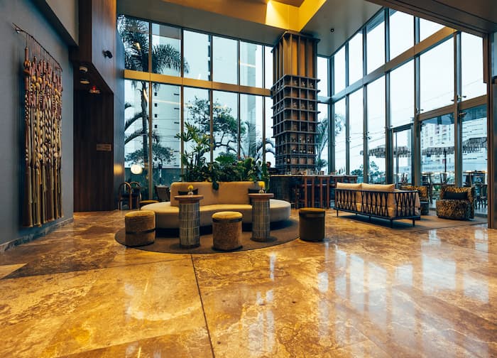 hero image for a lobby with a large glass wall and a large window
