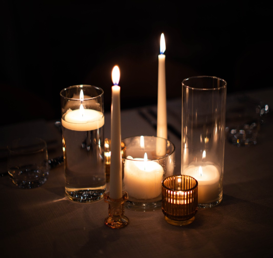 a group of candles on a table